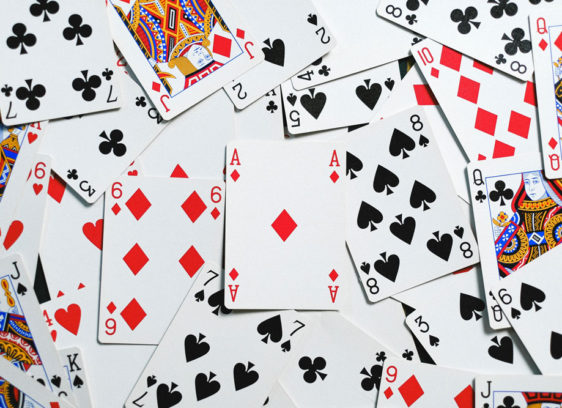 California Cardrooms Face New Uncertainty Amid Regulatory Push and Tribal Dispute Scattered cards