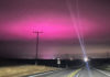 Purple Haze The night sky glows purple recently above the Pajaro Valley as electric lights from a greenhouse on Hilltop Road change to hue of the fog-laced sky.