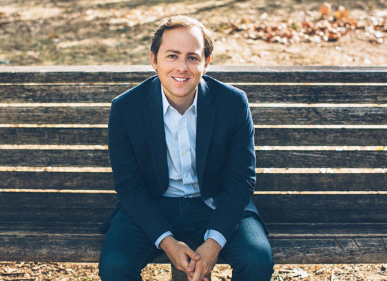 DROWING? NOPE David Litt seated in a casual blue suit