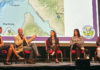 An ocean view, pollution included Panel of five speakers discussing ocean pollution at the Rio Theatre in Santa Cruz, seated before a map of Monterey Bay and the Salinas River.