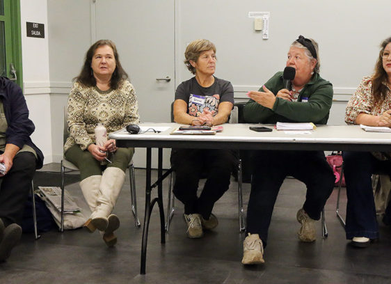 Residents Want Local Control Panelists discuss the risks of large-scale battery storage systems during a public meeting at the Simpkins Family Swim Center in Live Oak.