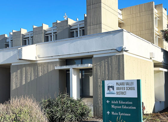 Big Layoffs Exterior of the Pajaro Valley Unified School District headquarters building in Watsonville, California, on a clear day.