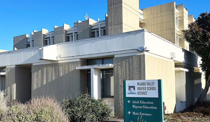 Public Weighs In on 150 Proposed Layoffs in PVUSD Exterior of the Pajaro Valley Unified School District headquarters building in Watsonville, California, on a clear day.