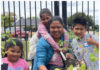 The Editor’s Desk A smiling woman and three children plant vegetables together in portable grow bags during a Monterey Bay Master Gardeners workshop.