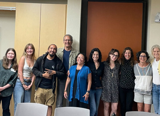 Participants and organizers gathered during a Santa Cruz poetry and education program