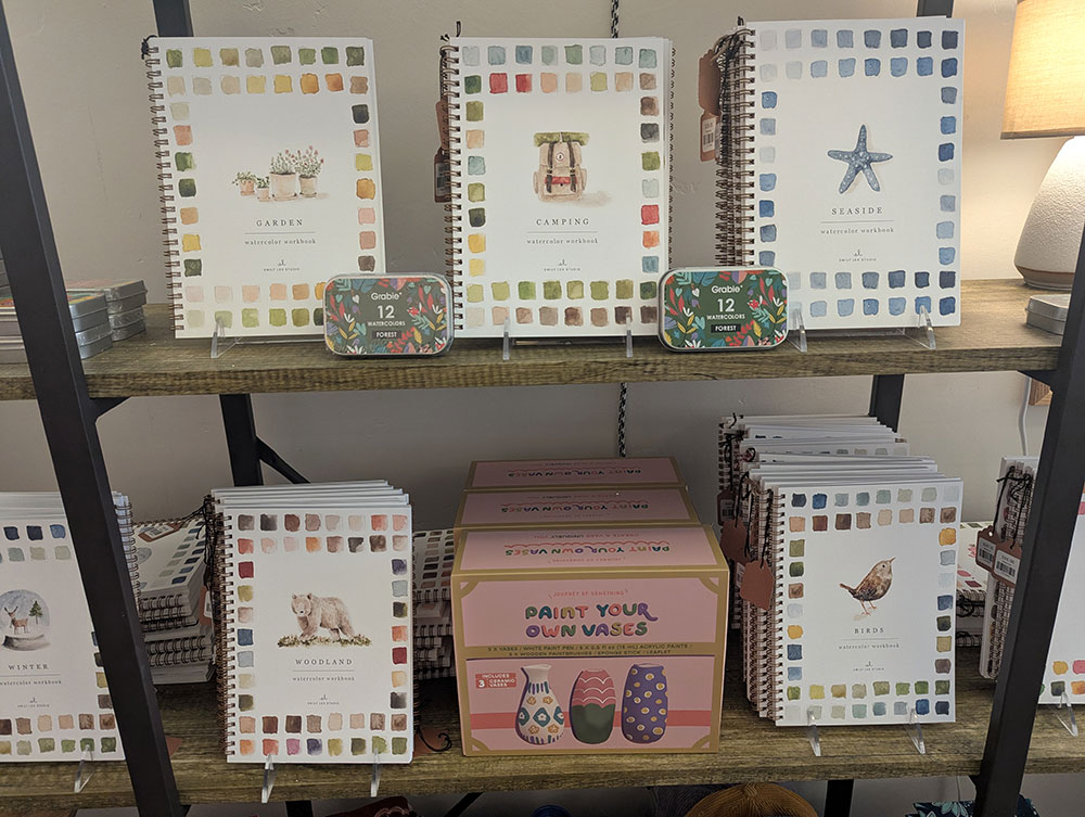 Shelves with displays of coloring books and other items