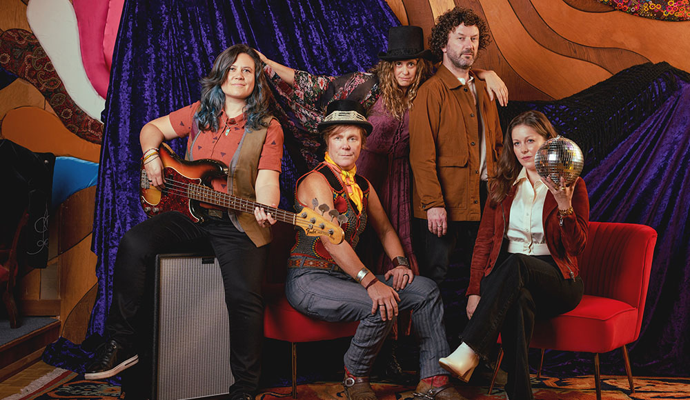 Members of Fleetwood Macramé pose together during a promotional photo shoot.