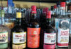 The Editor’s Desk Bottles of rum from around the world displayed on shelves at a Santa Cruz Wharf restaurant bar.