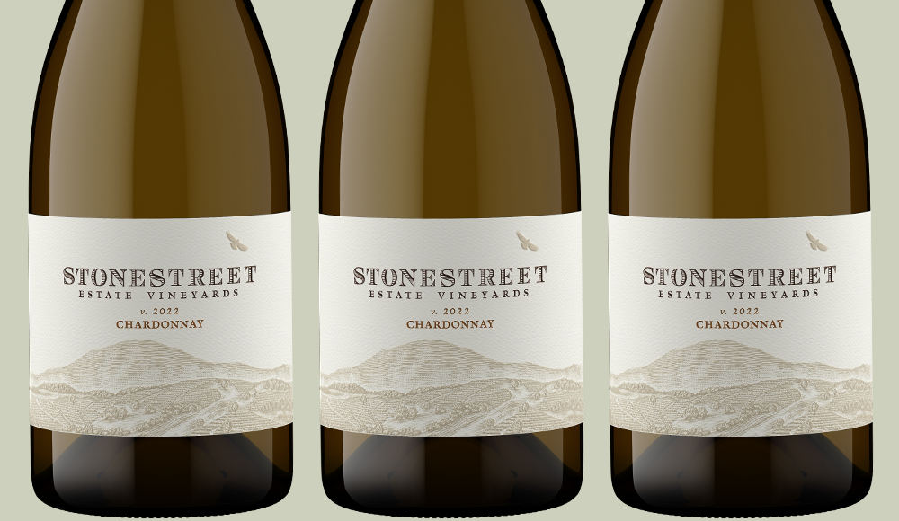 Three bottles of Stonestreet Estate Vineyards 2022 Chardonnay displayed against a neutral background.
