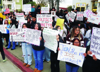 A Show of Student Force Students hold handmade signs during a walkout protest outside Watsonville High School.