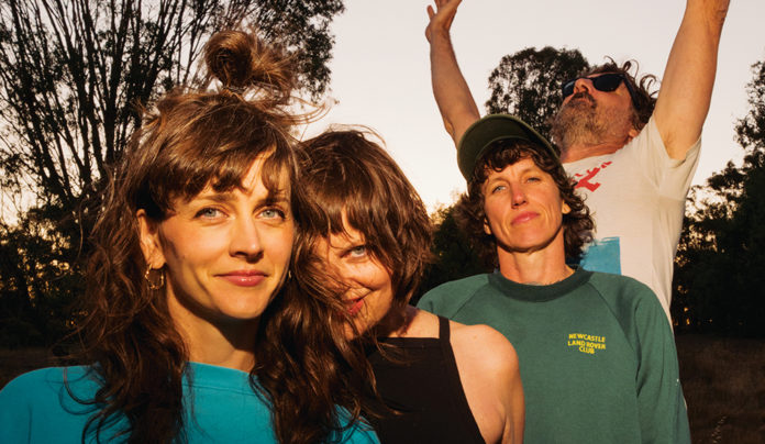 Things to do in Santa Cruz Australian experimental rock band Tropical Fuck Storm pose outdoors in natural light.