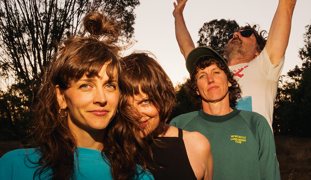 Australian experimental rock band Tropical Fuck Storm pose outdoors in natural light.