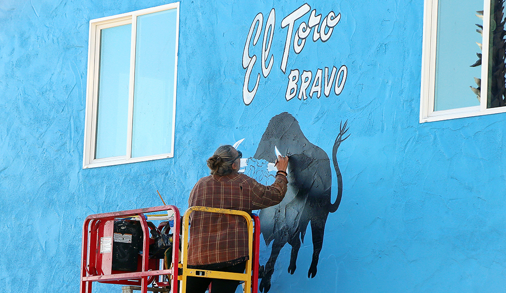 A mural is painted on the exterior wall of El Toro Bravo in Capitola.