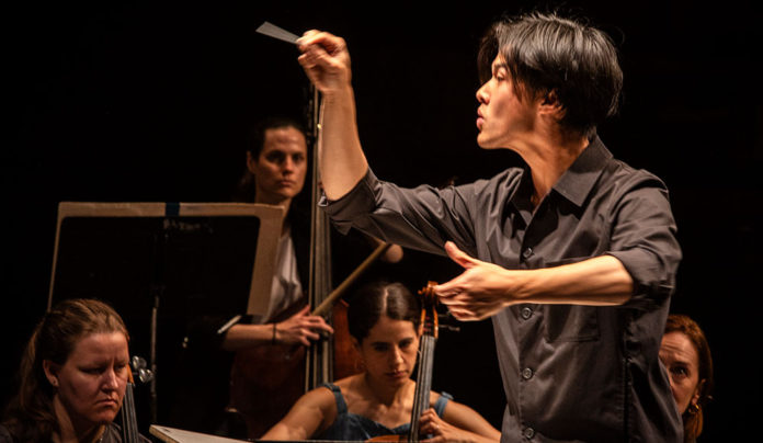 From Beach to Bach Guest conductor Alan Truong leading Espressivo chamber orchestra in performance