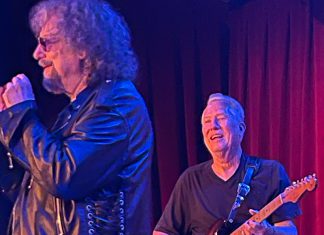 Whammer Jamming Magic Dick performs with guitarist Anson Funderburgh during a live blues show.