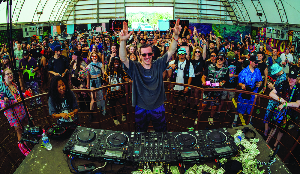 DJ Neumonic performs for a packed crowd at Equinox 2025.