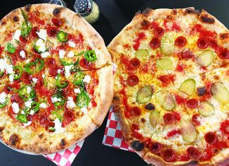 Za Za Boom Two wood-fired pizzas at Pogonip Pizza topped with pepperoni, dill pickles, jalapeño, mozzarella and hot honey.