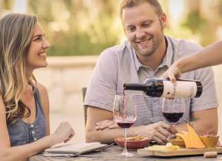 Wine Resort Guests enjoy wine on the patio at Allegretto Vineyard Resort in Paso Robles.