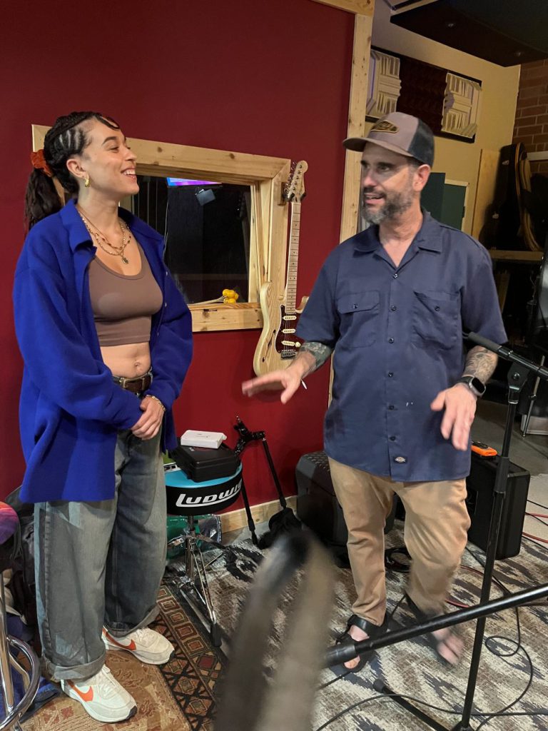 Vocalist Lo Steele and guitarist Charlie Hunter talk in the studio while working on their album collaboration Only a Drop.