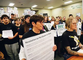 PVUSD Layoff Protest Teachers and staff hold a petition and protest PVUSD layoffs during a packed Pajaro Valley Unified School District board meeting in Watsonville.