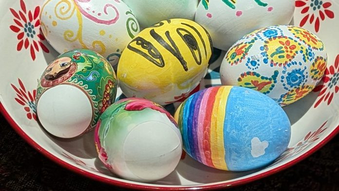 Iranian Students React Painted eggs and colorful markers used for Tokhm-Jangi, a traditional Nowruz game, at a UC Santa Cruz student celebration