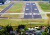 Housing Too Close to Runway Runway at Watsonville Municipal Airport with nearby residential neighborhood in the foreground.