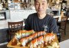 Crudo & Creative Chef Jun Park presenting sushi rolls at Sushi Qu restaurant in Watsonville.