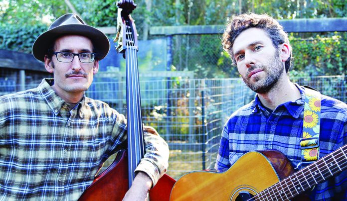 Two of a Kind Musicians Moshe and Boaz Vilozny with guitar and upright bass at Ugly Mug Coffeehouse