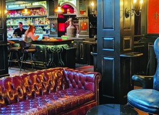 Bar Thrall Interior of The Hotel bar in Santa Cruz with leather seating and ornate decor