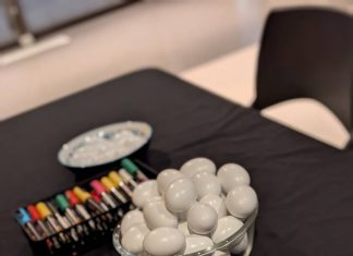 Iranian Students React Painted eggs and colorful markers used for Tokhm-Jangi, a traditional Nowruz game, at a UC Santa Cruz student celebration