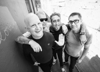 Before the World Caves In Good Riddance band members pose together in Santa Cruz alley