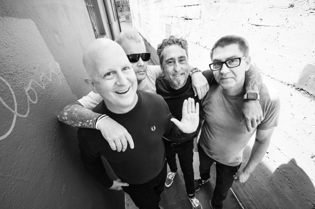 Good Riddance band members pose together in Santa Cruz alley