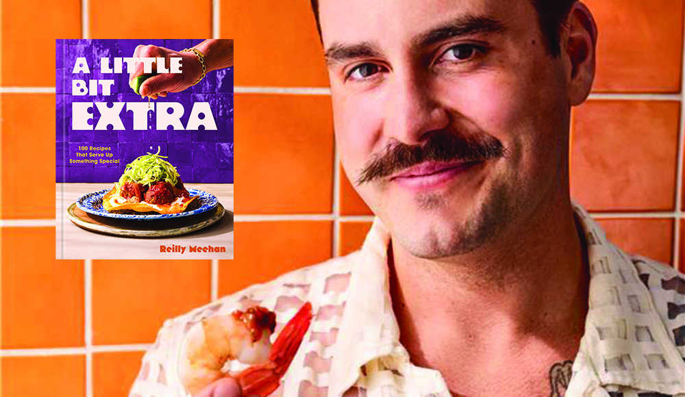 Chef Reilly Meehan holding shrimp with A Little Bit Extra cookbook cover