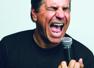 Don’t Call Him Bro, Dude Joe Sib comedian performing with microphone