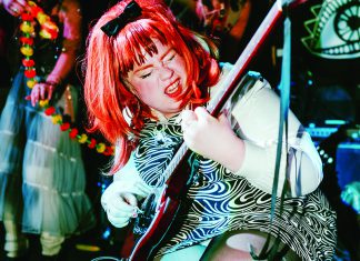 Things to do in Santa Cruz Abby Jeanne performing live with guitar