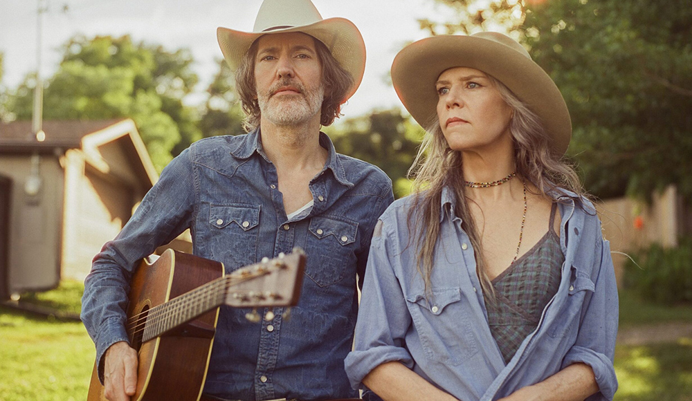 Gillian Welch and David Rawlings perform acoustic music outdoors