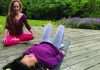 Shake, Breathe, or Rewire? woman practicing guided relaxation on yoga mat with instructor outdoors Santa Cruz
