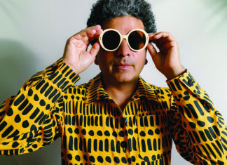 Rippling Santa Cruz Helado Negro wearing sunglasses and patterned shirt