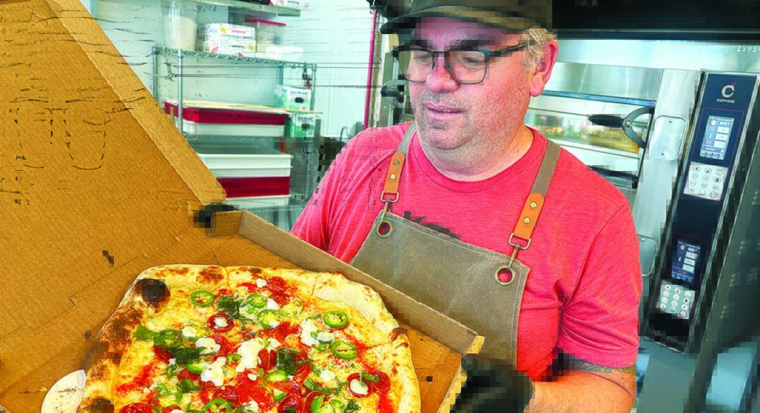 Ryan Thompson Pogonip Pizza Santa Cruz chef holding pizza