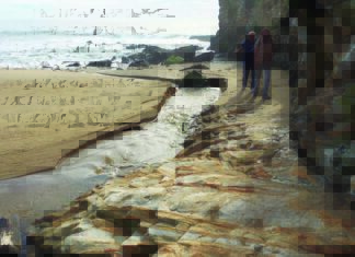hikers rocky shoreline California Coastal Trail Santa Cruz cliffs