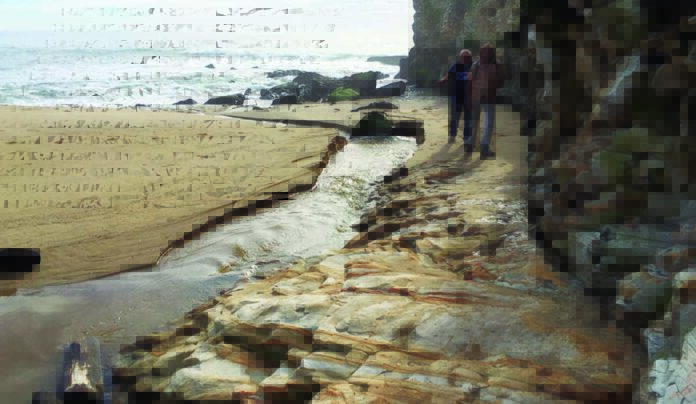 The Editor’s Desk hikers rocky shoreline California Coastal Trail Santa Cruz cliffs