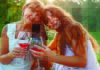 Vino For Moms two women toasting wine outdoors mothers day celebration lifestyle