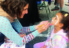 Kids Rule Downtown Child getting face paint at Santa Cruz Kids Day downtown