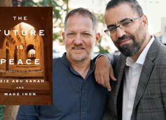 Path to Peace Aziz Abu Sarah and Maoz Inon stand together beside book The Future is Peace