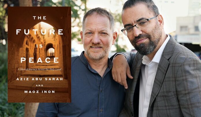 Path to Peace Aziz Abu Sarah and Maoz Inon stand together beside book The Future is Peace