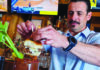Going Big A bartender tops a Bloody Mary at Bruno’s Bar & Grill with a pork slider.