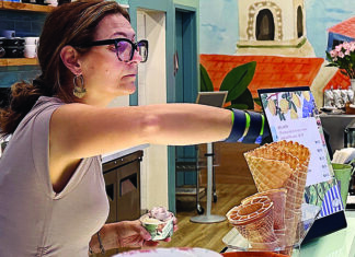 Italian I Scream Gran Gelato Caffe owner Luciana Costanza serves homemade gelato in downtown Santa Cruz.