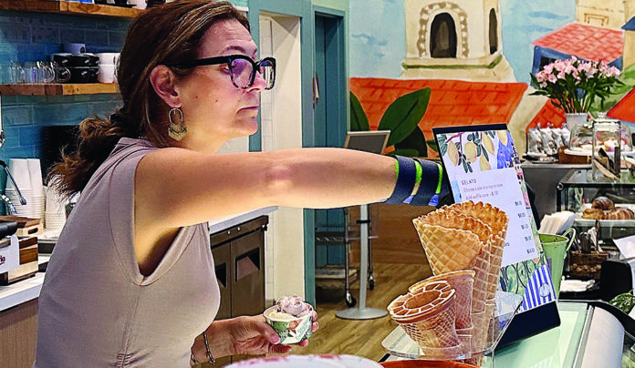 Italian I Scream Gran Gelato Caffe owner Luciana Costanza serves homemade gelato in downtown Santa Cruz.