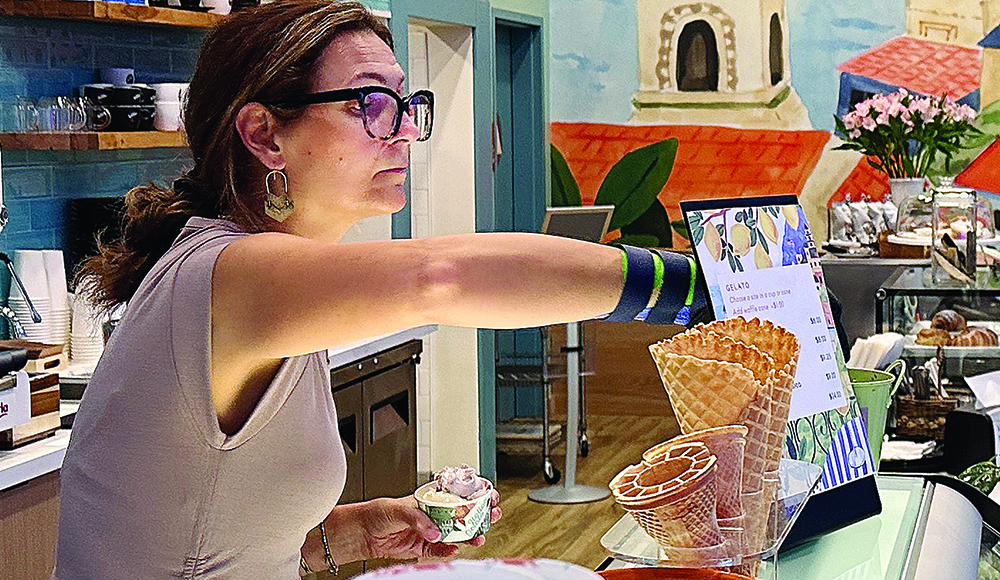Gran Gelato Caffe owner Luciana Costanza serves homemade gelato in downtown Santa Cruz.
