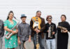 Music to Save Humanities Santa Cruz world music band AZA poses with instruments.